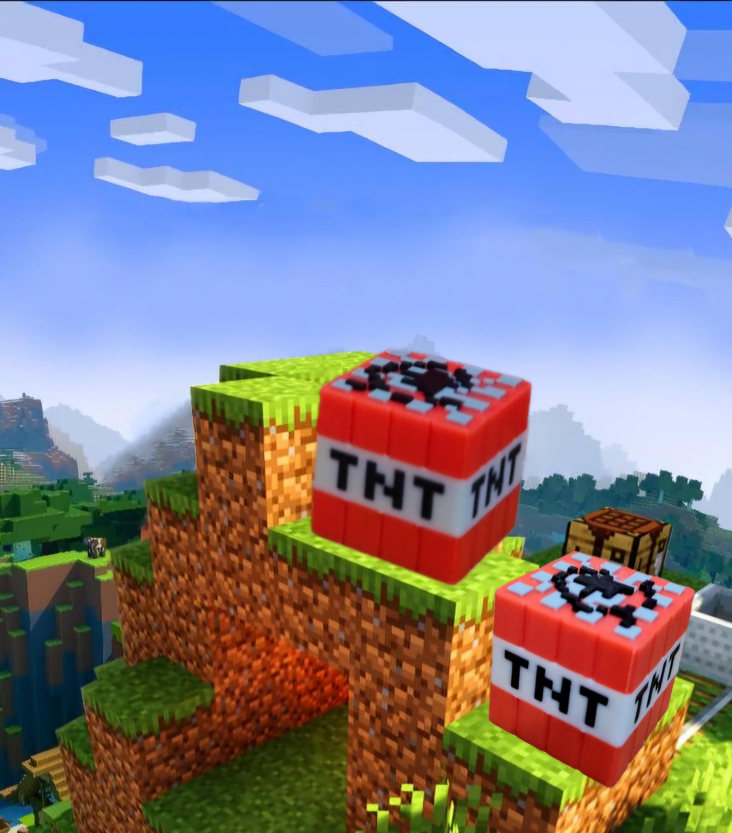 Two Minecraft TNT solid blocks.