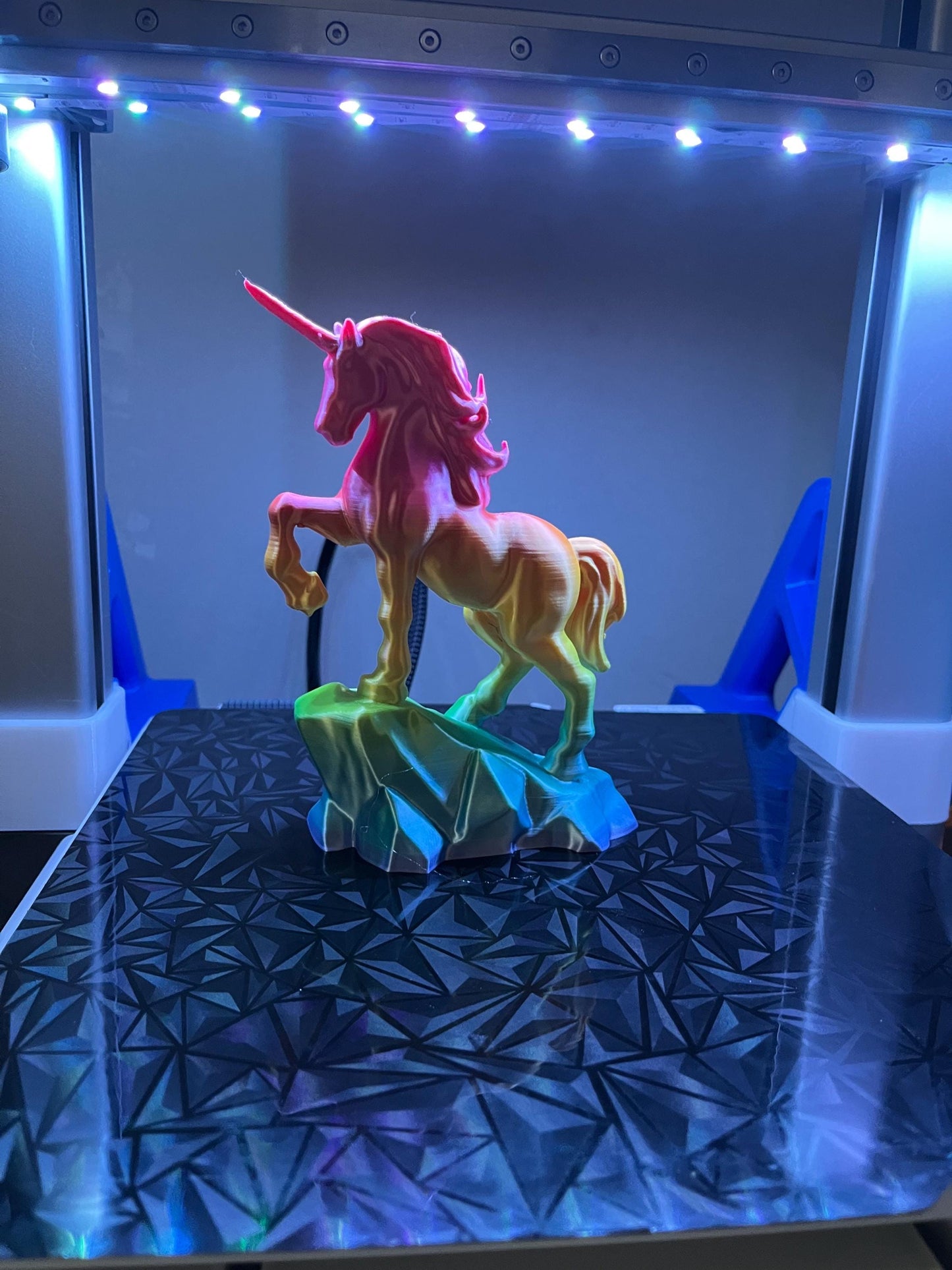 3D Printed Rainbow Coloured Rearing Unicorn.