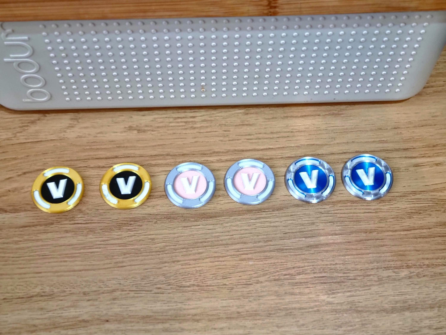 Fortnite double sided shiny V-Buck coin in Blue, Pink, Gold or Glow in the Dark vbuck.