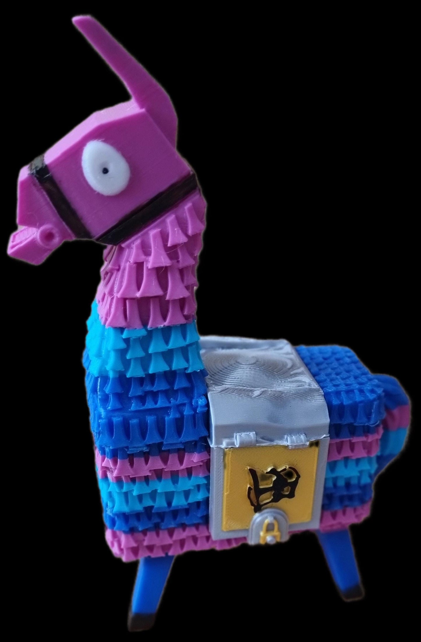 Piñata Llama Figuring. Fortnight gaming accessory with detailed gold and silver saddle bags.