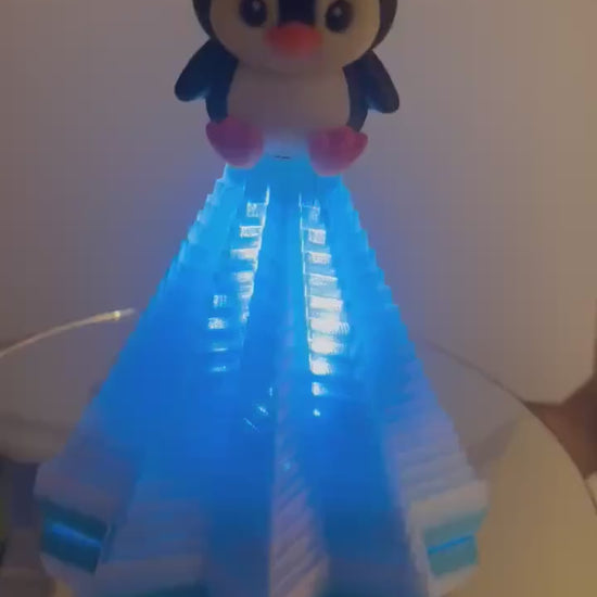 Fidget Penguin Iceburg optional 3xLED light and 3xAAA batteries.